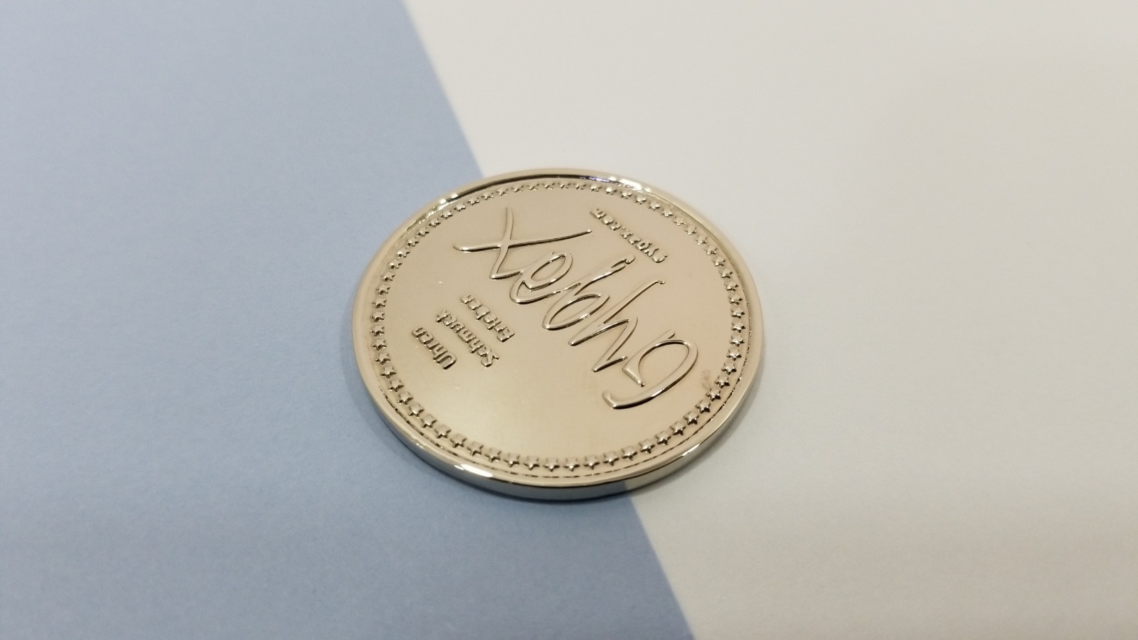 stamped coin used as a gift voucher for a jeweler.