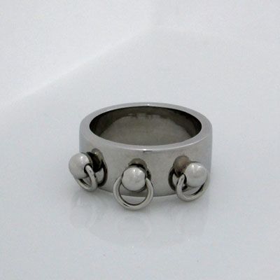 Silver ring with jump rings.